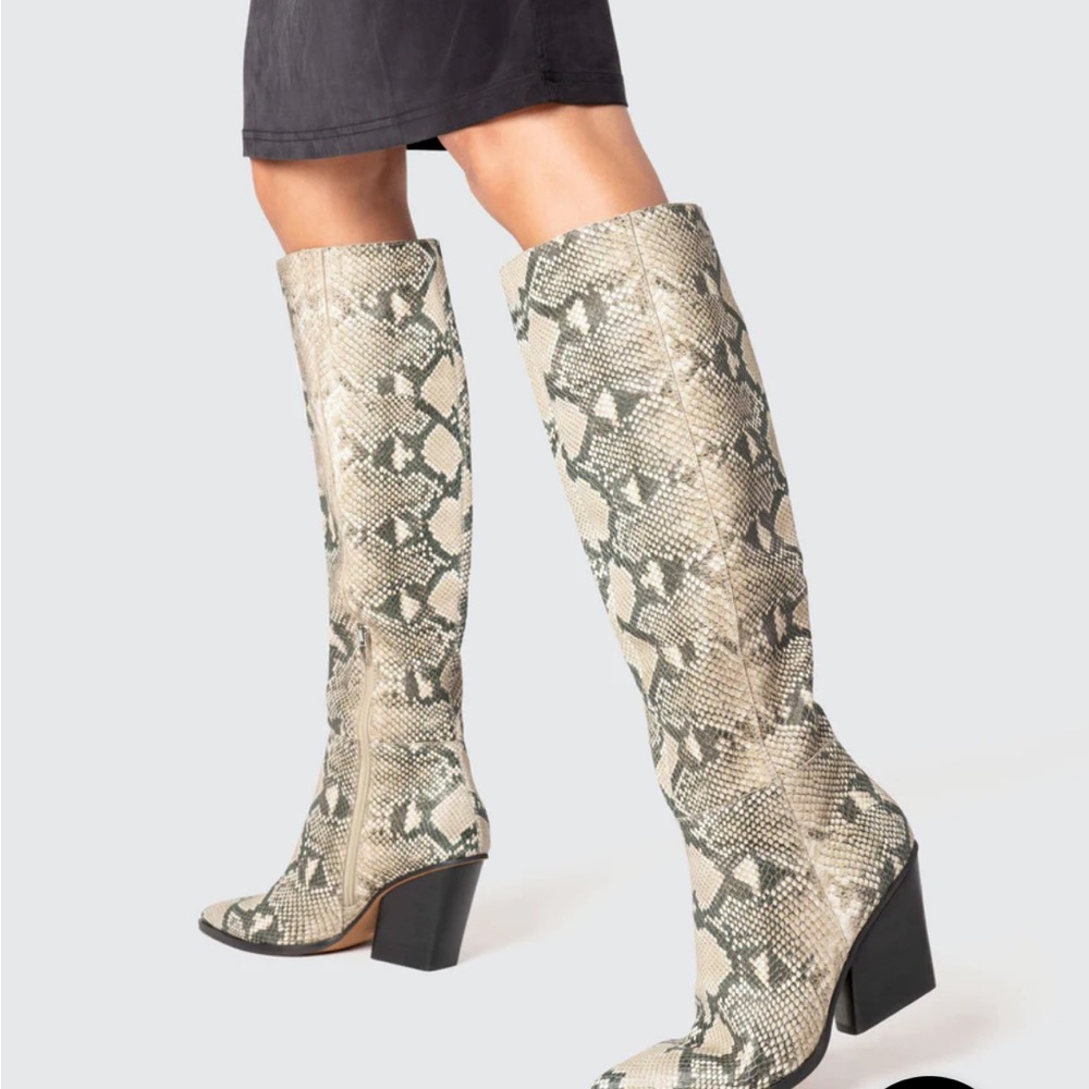 Beautiful snake skin leather knee high Isobel boots by Dolce Vita. Almost new!
